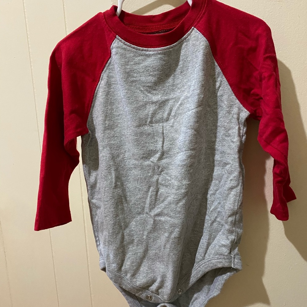 red and grey onesie